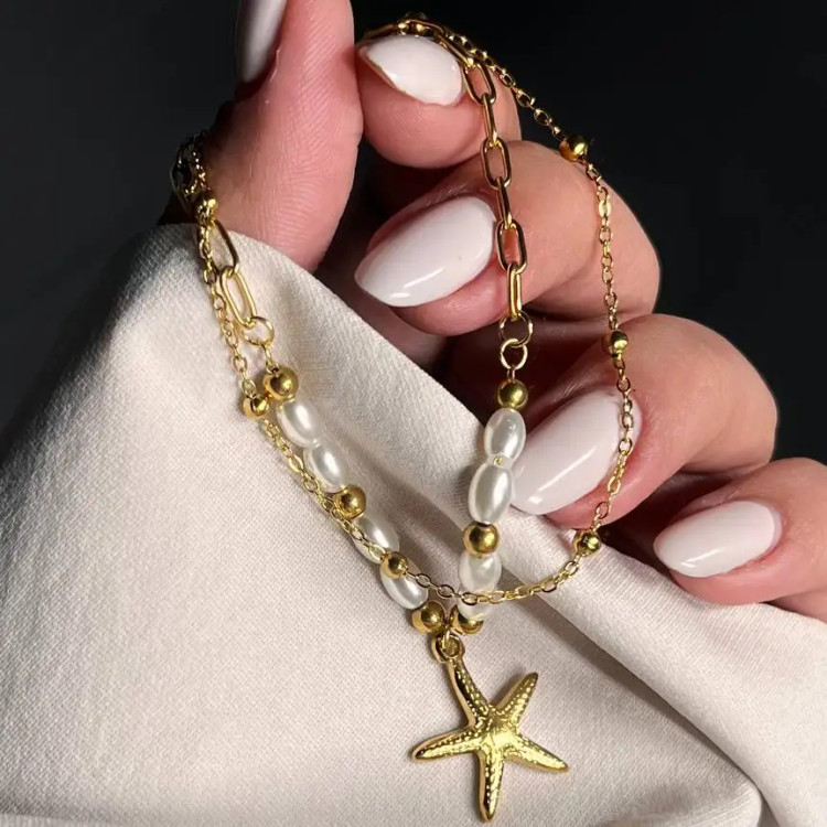 دستبند زنانه و دخترانه استیل طرح آویز ستاره دریایی مدل دولاین مروارید ضد حساسیت رنگ ثابت کد atk (پس کرایه)