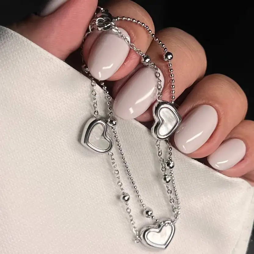 دستبند زنانه و دخترانه استیل طرح دولاین آویز قلب سفید ضد حساسیت رنگ ثابت کد atk (پس کرایه)