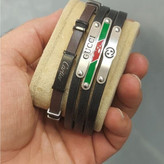 دستبند چرمی قفل و پلاک استیل مردانه طرح رولکس Rolex کیفیت چرم عالی تنوع طرح رنگ ثابت کد bn (پس کرایه)