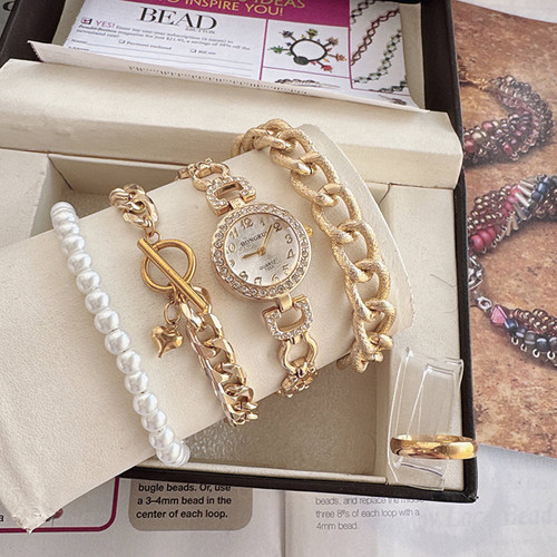 ست کامل زنانه ساعت هانگری طلایی و سه دستبند استیل و مروارید وحلقه قیمت استثنایی ارسال رایگان